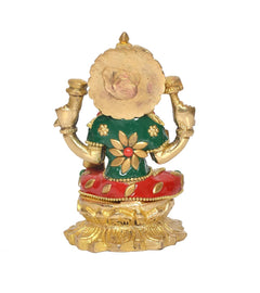 Brass Lakshmi idol statue back view, green top and red skirt with gold detailing