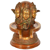 Trimukhi Shiva Lingam statue with three faces, central lingam on circular base