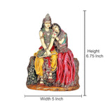 Radha-Krishna resin idol; height 6.75 in, width 5 in, colorful seated couple on base