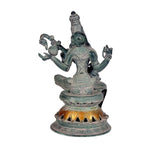 Saraswati brass statue seated with veena, raised arms and crown, dark green patina finish