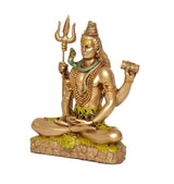 Shiva dashboard sculpture three-quarter view, holding trident and drum, green base, gold finish