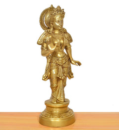 Brass Radha murti idol in profile, ornate headdress and patterned outfit
