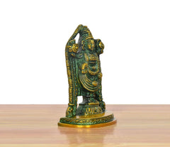 Tirupati Bala Ji idol brass statue, angled side view; gold face and green robe