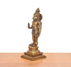 Hanuman ji brass statue side view, holding mace, detailed armor and pedestal