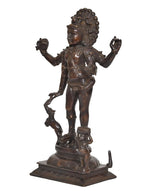 Brass-toned Bhikshatana Shiva sculpture, side view with ornate head and outstretched hands