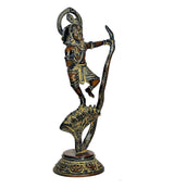 Brass Krishna statue dancing on Kaliya serpent, side view, bronze-gold detailing