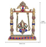 Brass Ganesha swing idol, 10.25 in high, 9 in wide, gold with painted accents
