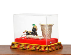 Laddu Gopal Krishna decorated box with balti pichkari, figurine and silver tube
