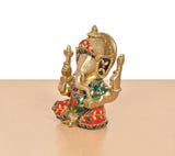 Brass Ganpati idol, side view with decorated crown and multicolor enamel garments