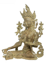 Brass Tara Devi seated idol, side profile, detailed robe and beaded ornaments