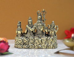 Brass Shiv Parivar showpiece: Shiva on rock base with four companions, detailed attire