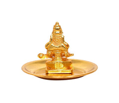 Brass goddess idol seated on round plate, front view with ornamented jewelry