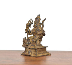 Copper Shiv Parivar statue, side view, multi-armed deity with decorative pedestal