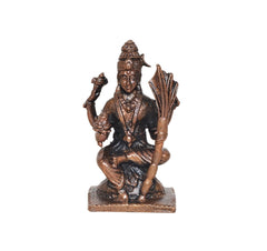 Copper deity sculpture on pedestal, ornate crown and draped attire, 2 inch height
