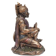 Bronze Lord Hanuman figurine, 7.5 in, angled side view with purple draped cloth and jewelry