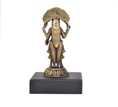 Back of 3.5 inch Vasavi Kanyaka Parameshvari idol with gold-toned detailing and dark base