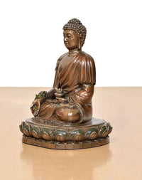 Gold resin meditation Buddha statue, angled view, beaded headpiece and lotus pedestal