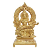 Golden brass Ganesh idol seated cross-legged, halo backdrop, raised arm