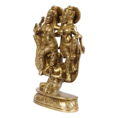 Brass Lakshmi and Vishnu on Garuda idol from rear angle with seated figure