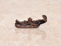 Copper Vishnu-Lakshmi idol on Sheshnag serpent, side profile of ornate base