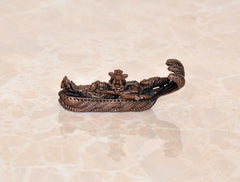 Copper Vishnu-Lakshmi idol on Sheshnag serpent, side profile of ornate base
