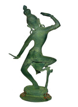 Brass Shiv Parvati statue back view, dancing pose, green patina finish, circular base
