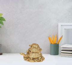 Brass turtle figurine: stacked turtles with textured shell, 3-inch height