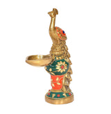 Brass peacock oil lamp diya, gold details, red and green painted body with flower motif