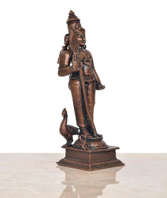 Copper Kartikeya Murugan statue three-quarter view, holding long staff, 6 inch