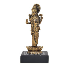 Standing Lakshmi statue, side profile with raised arms, gold finish on black base
