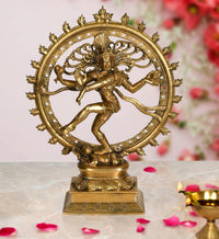 Brass dancing Nataraja Shiva idol with ornate circular halo, ~13.5 in tall
