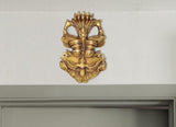 Brass Kirtimukha wall hanging with detailed lion-face mask, gold finish