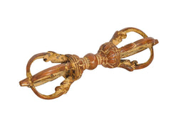 Brass eight-pronged dorje with bow-like loops, angled view