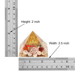 Orgonite chakra pyramid shown with ruler: 2 in height and 2.5 in width
