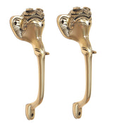 Golden brass Ganesha face door handle pair, front view of two handles