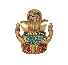 Brass Ganesha statue back view with ornate crown and blue-red beaded detailing
