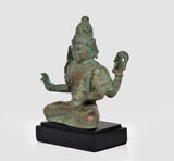 Bronze Lord Vishnu statue in profile, seated pose with four arms, on black base