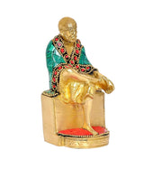 Brass Sai Baba statue, seated posture on gold pedestal with green robe