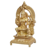 Golden brass Ganesh idol with ornate halo, seated posture, raised hand