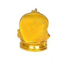 Golden back of Lord Kuber idol statue, round halo detail