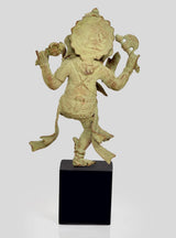 Dancing bronze Ganesha figurine in arched stance, on dark cube base