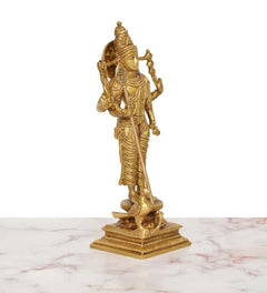 Brass Kartikeya idol rear/3-quarters view, raised arms and standing pose on base