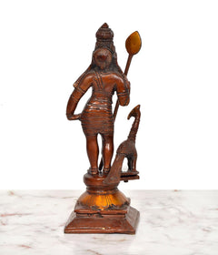 Back view of brass Karthikeya statue standing, peacock beside pedestal