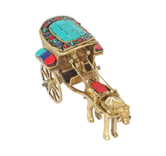 Brass horse cart ornament, angled view, turquoise roof with red and blue side blocks