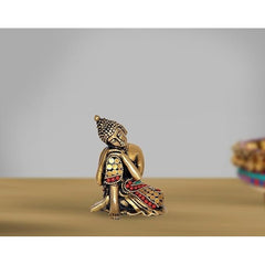 Brass resting Gautam Buddha idol, beaded crown and seated robe with red accents