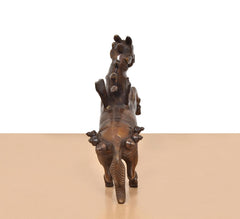 Brass flying horse with wings, rear view, detailed tail and hind legs
