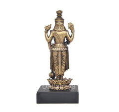 Lord Vishnu idol viewed from behind, four-armed pose, gold-tone finish on black base