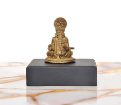 Golden Maa Annapurna Devi idol rear view, seated on black base (1.75 in)