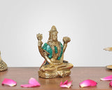 Brass Bholenath Lord sculpture, teal robe over golden base, raised arm poses