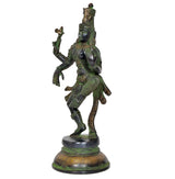 Ardhanrishvara (Shiva-Parvati) deity statue, side view, ornate crown and flowing drape